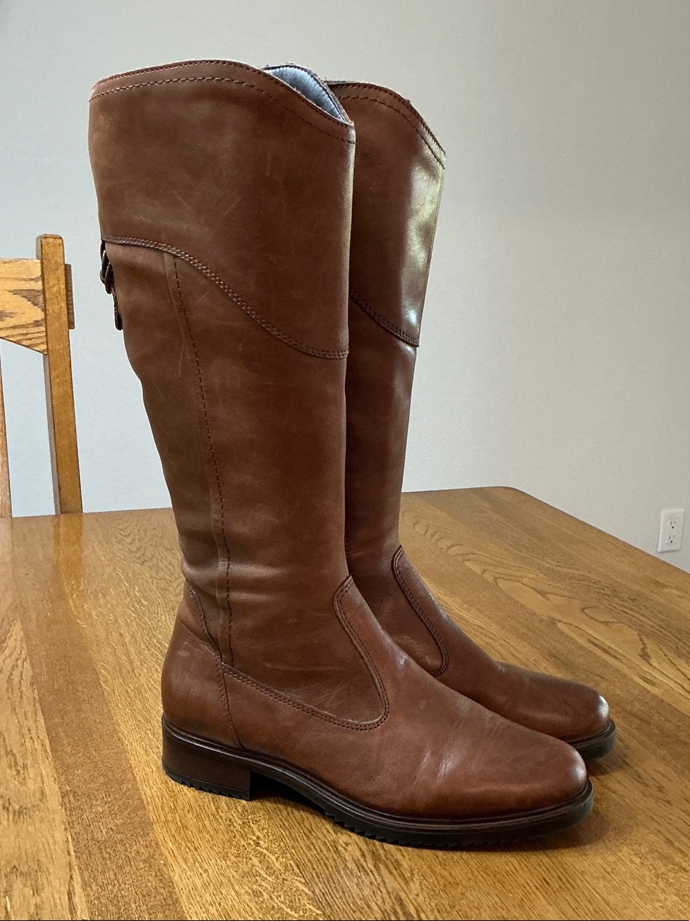 Woman’s Tamaris brown leather tall boots. Size 37.Fleece lined. Barely worn.Cute